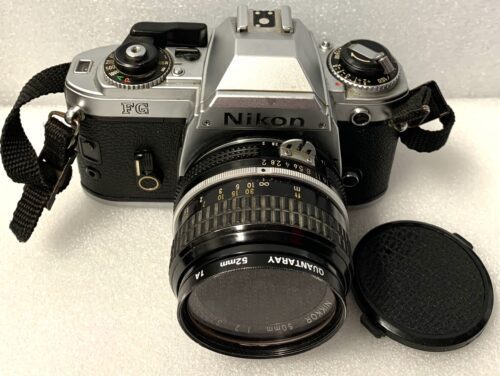 Vintage Nikon FG 35 mm SLR Film Camera with Nikon 50 mm Lens & Rokinon 2000 Camera Flash